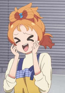 a girl with orange hair is making a face with her eyes closed