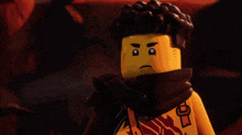 a ninjago character holding a sword with a rainbow blade