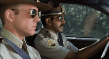 police look stare ride sunglasses