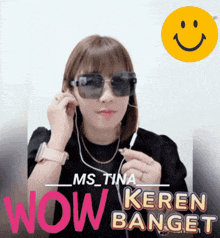 a woman wearing sunglasses and ear buds says wow keren gantet