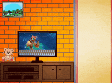 a teddy bear sits on a shelf next to a tv