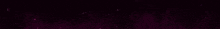 a close up of a pink light beam on a black background
