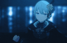 a girl with a rose in her hair is wearing a black dress