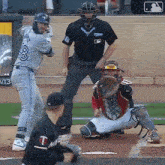 a baseball player with the number 8 on his jersey is at bat