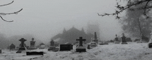 a cemetery with a church in the background
