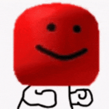 a red cube with a smiley face and a drawing of a person standing next to it .
