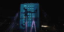 Projection On Building Alan Walker GIF - Projection On Building Alan Walker Time GIFs