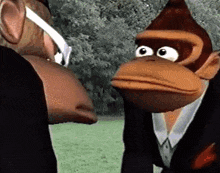 a man and a monkey are talking to each other .