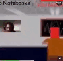 a man is looking out of a window at a laptop .