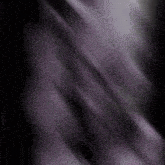 a black and purple background with a few lines