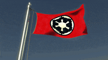 a red flag with a white star in the middle is flying in the wind