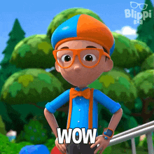a boy from blippi is standing with his hands on his hips and saying wow