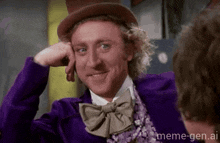 a man in a purple suit and top hat is smiling with his hand on his face .