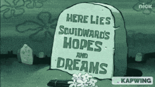 a gravestone from spongebob squarepants says here lies squidward 's hopes and dreams .