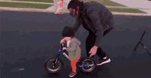 Learning To Ride Kid Riding A Bike GIF - Learning To Ride Kid Riding A Bike Learning GIFs