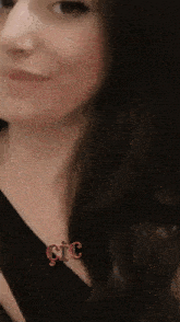 a close up of a woman 's face with the word cic in red letters