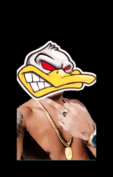 a shirtless man wearing a gold chain and a sticker of a duck on his face