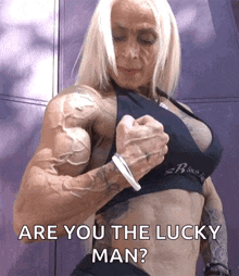 a woman flexing her muscles with the words are you the lucky man