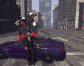 a man standing next to a purple car in a city