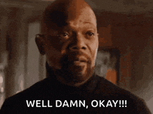 a man with a beard is saying `` well damn , okay !! ''