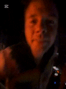 a blurred image of a man playing a musical instrument with the caption capcut