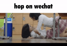 two girls laying on the floor with the words hop on wechat written above them