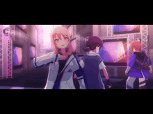 a girl in a white jacket with the letter a on it stands in front of a screen