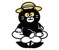 a black cat is wearing a yellow hat and sitting on a flower