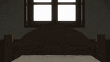 a girl with her eyes closed is laying on a bed
