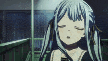 a girl with blue hair and pigtails has her eyes closed and her mouth open