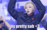 a man in a blue shirt is dancing with the words " my pretty sub < 3 " above him