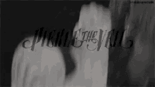 a black and white photo of a person holding a piece of paper with the words `` picking the evil '' written in the background .