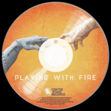 a cd that says playing with fire on the front