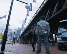 Tony Jaa Kicks Lampost GIF - Parkour Stunt Martialart GIFs