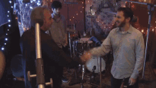 Shaking Hands Neil Diamond GIF - Shaking Hands Neil Diamond Melody Road Song GIFs