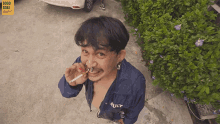 a man with a cigarette in his mouth is wearing a shirt that says ruly