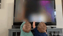Twins Kiddos GIF - Twins Kiddos Poking The Tv GIFs