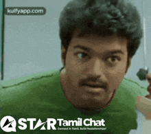 a man in a green shirt is on a star tamil chat screen
