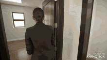 a woman in a suit is standing in an empty room made by animatica