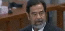صدام GIF - Saddam Hussein In Court Defending GIFs