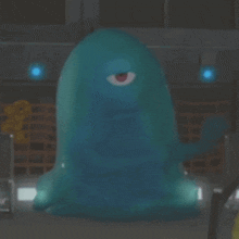 a blue monster with one eye is standing in a room