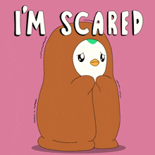 a cartoon of a penguin wrapped in a brown blanket with the words " i 'm scared " below it