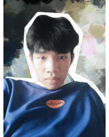 a boy wearing a blue shirt that says msgm