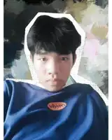 a boy wearing a blue shirt that says msgm