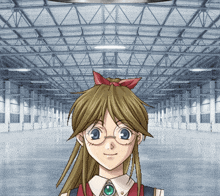 a girl with glasses and a bow in her hair is standing in a warehouse