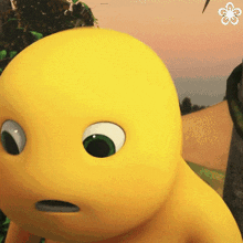 a close up of a yellow cartoon character 's face