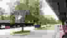 a blurred image of a person 's face is displayed in a pixel art style