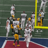 a football player wearing a number 19 jersey stands on the field