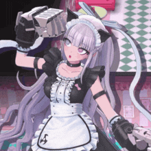 a girl in a maid costume is holding a box in her hand