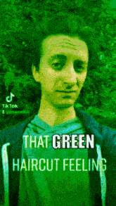 a man in a green shirt with the words that green haircut feeling